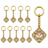 Cumpara ieftin 10 brelocuri aurii 9,3 cm cu romb 2,7 x 2,7 cm, cruce cu pietre artificiale, lant 3,2 cm, inel 2,8 cm, accesorii crestine pentru chei si marturii bote