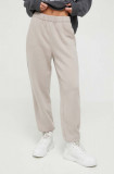 Cumpara ieftin Hollister Co. pantaloni de trening culoarea bej, neted