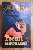 FOCURI ASCUNSE - Sandra Brown