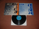Real Life: Flame (1985) vinil new-wave/synth pop, Made In USA, stare VG+/Ex, MCA rec