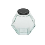 Borcan din sticla pentru miere 500 ml cu capac, model hexagonal