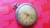 G660-I-Prima Homis Watch Art Deco 1930-40 Swiss Pure Nickel nefunctional geam repus plastic, diam. 5 cm.