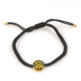 Bratara ajustabila cu snur negru si simbol lotus colorat