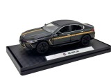 Macheta metalica BMW M8 Competition negru cu auriu scara 1:32 cu usi capota si portbagaj mobile