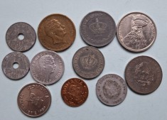 50 bani 1921, 25 bani 1921, 5 lei 1942,10000 lei 1947,20 lei 1942,500 lei 1946,3 lei 1963,100 lei 1992,10 lei 1992 circulata, total 11 monede 50 lei