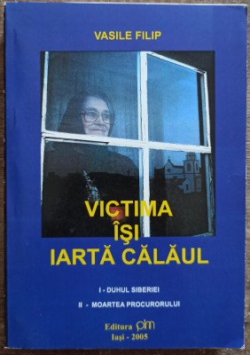 Victima isi iarta calaul - Vasile Filip// dedicatie si semnatura autor foto