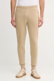 Lacoste pantaloni de trening culoarea bej, neted