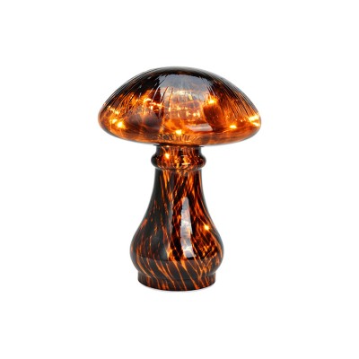 Ciuperca maro cu leduri foto