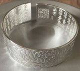 Brățară argint 999 marcată, motive asiatice, reglabilă, 46 g , elegantă, stare foarte bună, nouă, nefolosită