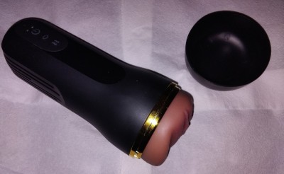 Masturbator tip Fleshlight cu 10 moduri de vibrații și sucțiune. foto