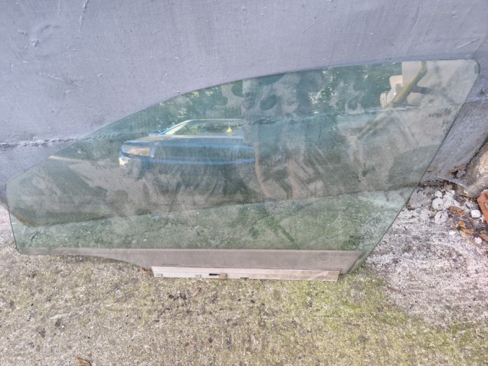 Sticlă geam ușă față st&acirc;nga Opel Astra H