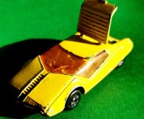 Datsun 128X Matchbox Superfast 1973 Lesney Prod.&amp; Co. nr.33 Made in England, vintage. Diecast, carcasă și placă ventrală metalică, galben orange. W