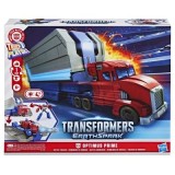 Transformers Earthspark Camion cu remorca de lupta Optimus Prime