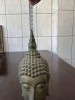 Cap vintage de Buda pe suport de lemn