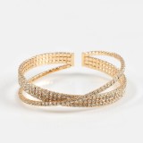 Bratara aurie fixa cu design incrucisat