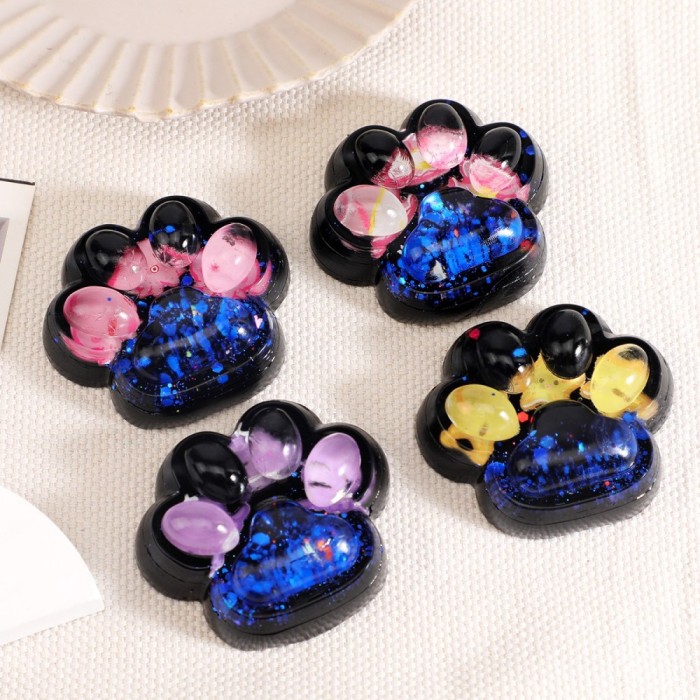 Jucarie antistres squishy, flippy, cu revenire lenta, model cat paw, 6.5 x 6 cm, din tpr, 4-6 ani, model 5 meduze, negru cu insertii