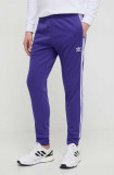 Adidas Originals pantaloni de trening culoarea violet, cu imprimeu IR9877