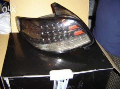 Vand set stopuri noi Dectane negre led tuning peugeot 206+ CADOU1 STOP LED DR. foto