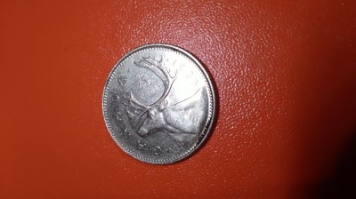 MONEDA CANADA 25 CENTI 1986 foto