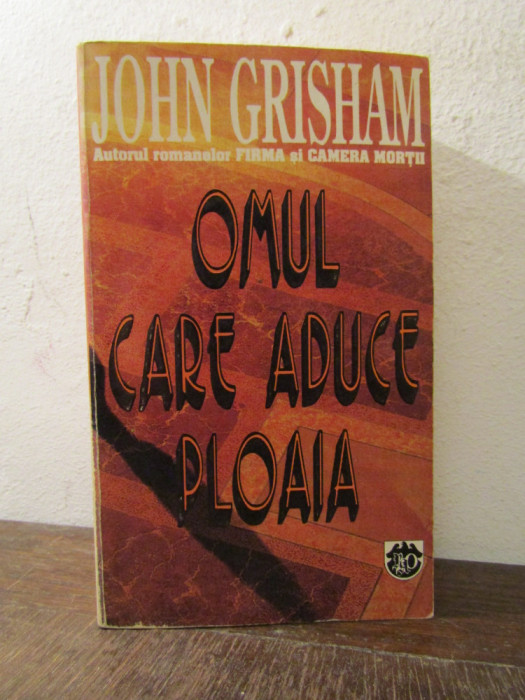 OMUL CARE ADUCE PLOAIA- JOHN GRISHAM