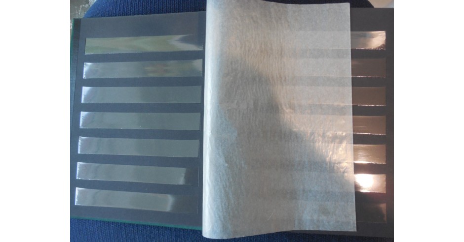 Clasor filatelic-format 25x20 cm-10 foi /20 pag,fond negru ,7 benzi/pag ...