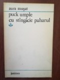 Puck umple cu stingacie paharul- Aura Musat