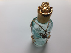 Sticluta de parfum-veche foto