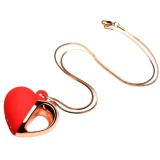 Stimulator clitoris CHARMED Heart Necklace, pandantiv &icirc;n formă de inimă pe colier, 10 funcții de vibrație, roșu cu auriu