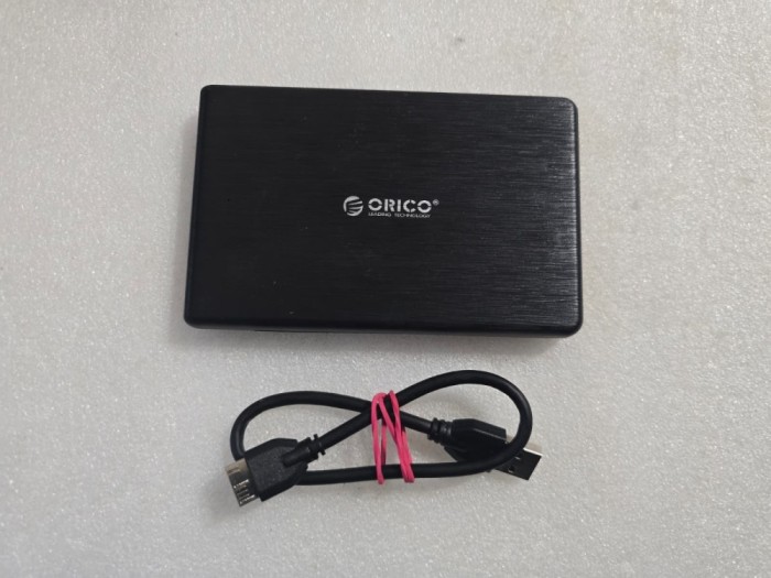 Hard Disk extern slim Orico 1TB, 5400rpm USB 3.0, 2.5" - poze reale