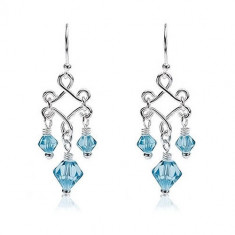 Cercei detașați din argint cu perle de sticlă albastre