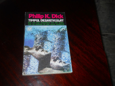 Philip K. Dick -Timpul dezarticulat, Nemira SF, 1994 foto