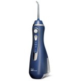 Dus bucal portabil WP-583 Blue Waterpik, portabil, fara fir, cu suport magnetic pentru incarcare rapida (4 ore), operare silentioasa, design rezistent