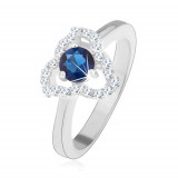 Inel realizat din argint 925, floare din zirconiu - centru albastru, contururi curbate de petale - Marime inel: 49