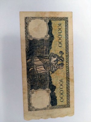 Bancnota folosita 100.000 lei foto