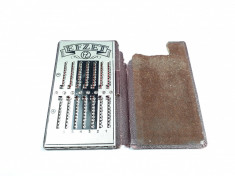 n Calculator mecanic de buzunar EFZET, vechi de colectie foto