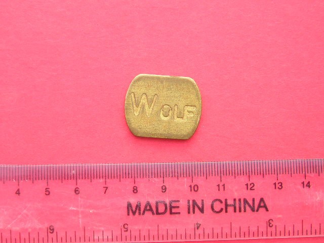 M3C1 6 - Jeton de colectie - inscriptia WOLF