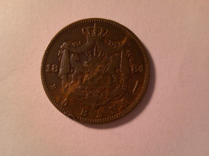 Moneda 5 Bani 1884 Carol I ,bronz cal. f.buna dar cu o lovitura pe muchie