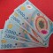 11 bancnote noi de 2.000 lei cu eclipsa