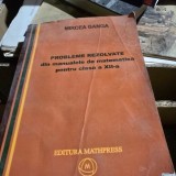 Probleme rezolvate din manualele de matematica pentru clasa a XII-a - Mircea Ganga