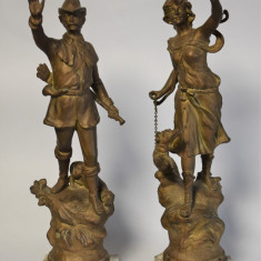 Doua statuete pereche antimoniu patinat - Vanator si Vanatoare - Franta c. 1900