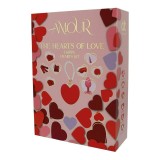 Kit DREAMTOYS Amour The Hearts Of Love, set 10 produse, cu vibrator, plug anal, mini bici, lum&acirc;nare de masaj și petale de trandafir