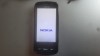 Telefon mobil Nokia C6-00 + alimentator, functionabil, Negru, Vodafone