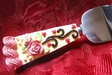 PALETA TORT MATERIAL INOXIDABIL DECOR CU TRANDAFIRI 25.5 CM