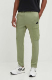 Adidas pantaloni de trening City Escape culoarea verde, cu imprimeu, IV7419