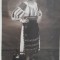 Fotografie tip carte postala, tanara in straie populare romanesti, perioada interbelica