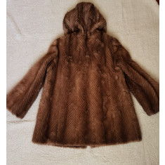 Cauti Caciula si haina de blana naturala de marmota? Vezi oferta pe  Okazii.ro