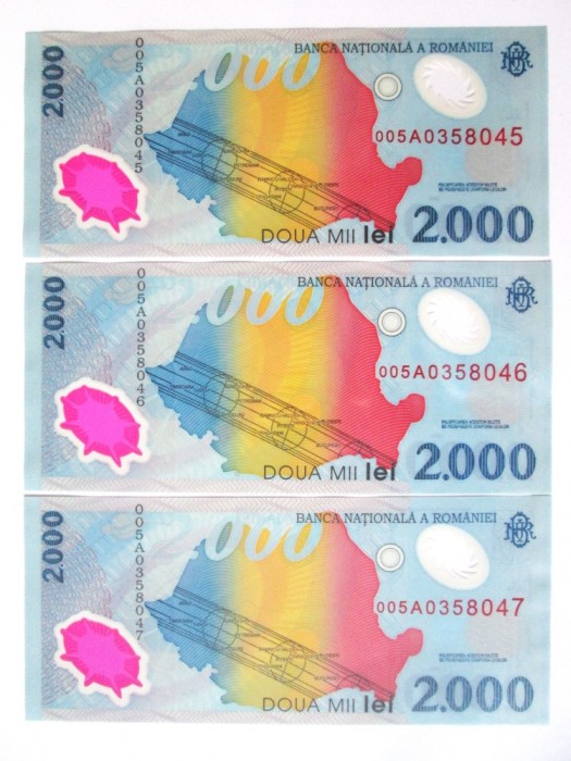 Romania lot 3 bancnote 2000 Lei 1999 UNC serii consecutive 005A,vedeti imaginile