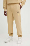 Lacoste pantaloni de trening culoarea bej, cu imprimeu