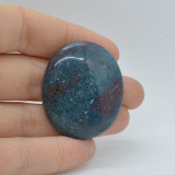 Cabochon rubin in kianit 39x32x7mm a12