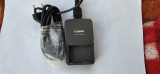 INCARCATOR CANON CB-2LWE LA 8,4 V/ 0,55 A , PENTRU ACUMULATORI FOTO .